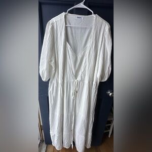Never been worn. White wrap dress